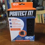 Tripp Lite By Eaton Protect It! 1,200-JOULES Direct Plug-in. Fixed Price $23.99.