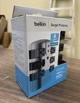 Belkin 6-OUTLET Rotating Pivot-plug Surge Protector 1080J Gray/black. Fixed Price $10.00.