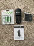 Radioshack Aaa Battery Kit (4 Rechargable Batteries, Charger + Manual, & Holder). Fixed Price $25.00.