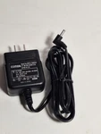 Comda Ac Adaptor Ite Power Supply 5VDC 2.3A NP12-1S0523. Fixed Price $10.50.